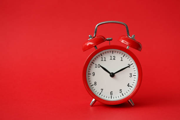 istock Red alarm clock show 10 hour vintage modern 1140797267