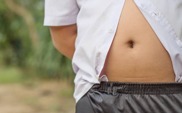istock fat boy overweight, healthy concept 1140798137