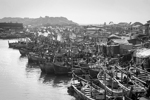 31 March 2019 - Boats resting in the harbor.  Elmina, Ghana.