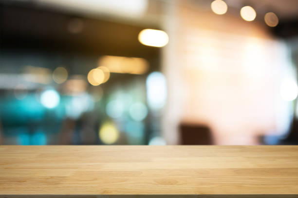 istock empty wood table in front of blurred coffee shop cafe background 1140801026