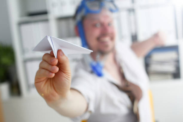 istock Man wearing suit and tie in goggles and snorkel 1140801765