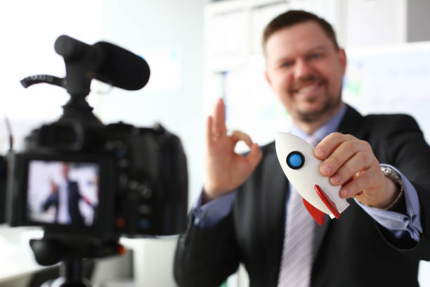 istock Businessman hold rocket in hand closeup 1140802304