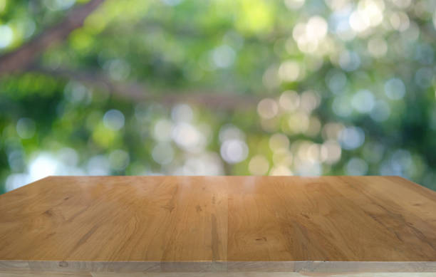 istock Empty dark wooden table in front of abstract blurred bokeh background of restaurant . can be used for display or montage your products.Mock up for space. 1140802429