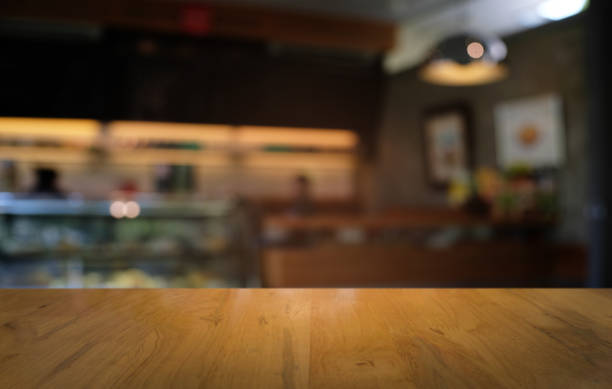 istock Empty dark wooden table in front of abstract blurred bokeh background of restaurant . can be used for display or montage your products.Mock up for space. 1140802443