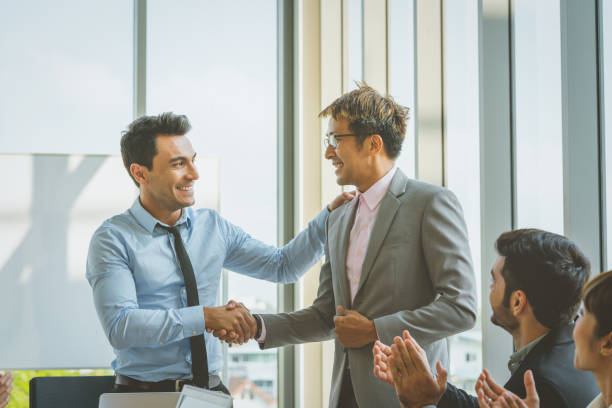 istock Business people shaking hands congratulations to work success 1140806819