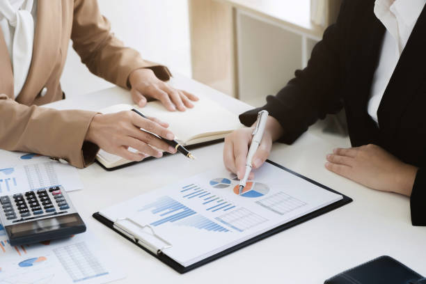istock business financier audit working with calculator and data annual report 1140808133