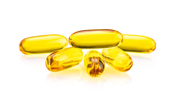 istock Fish Oil Capsules solated on white background 1140809665