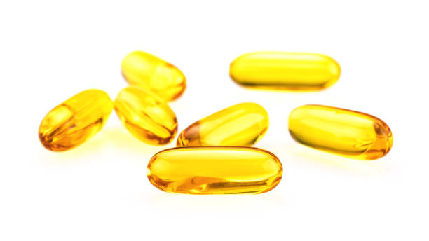 istock Fish Oil Capsules solated on white background 1140809675