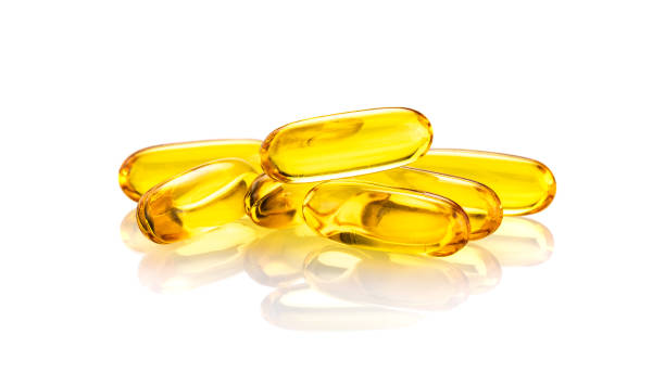 istock Fish Oil Capsules solated on white background 1140809687