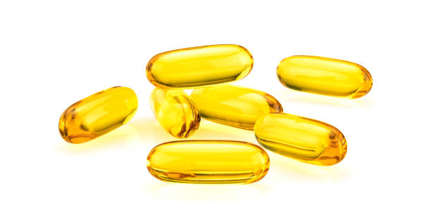istock Fish Oil Capsules solated on white background 1140809700