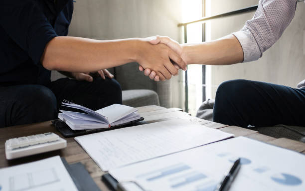 istock business executives partnership hand shaking 1140815055