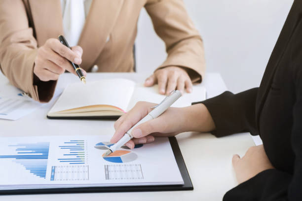 istock business financier audit working with calculator and data annual report 1140815062