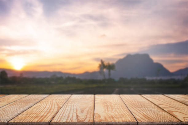 istock empty wood table in front of blurred montage wonderful mountain background 1140815100