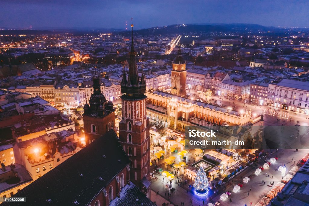 The Magic of Christmas Drone view of Krakow city at night decorated for Christmas Krakow Stock Photo