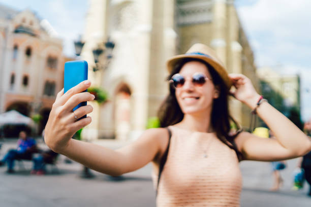 istock Female tourist making selfies 1140823564