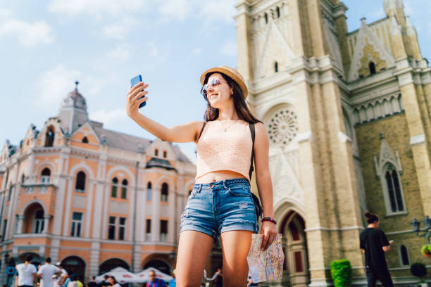 istock Female tourist making selfies 1140823632