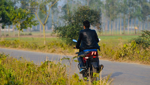 istock Man biking on a concrete road unique photo 1140825263