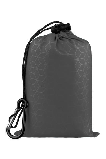 istock Very compact gray nylon pocket blanket in a drawstring bag with a carabiner. Thin tarp or footprint for outdoor activities. Isolated on white background, clipping path included. 1140825436