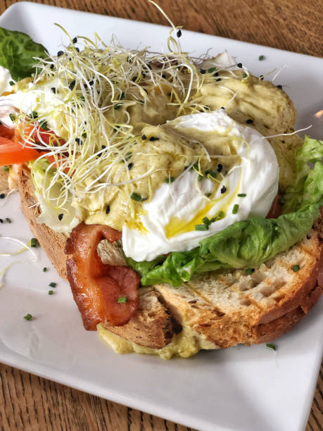 istock Egg Benedict with ham and salad on a toast bread 1140831357