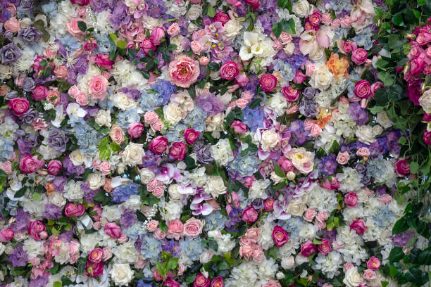 istock Flowers background.Roses and lilies. Space for text 1140831931