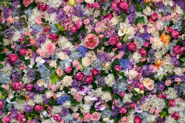 istock Flowers background. Roses and lilies. 1140832449