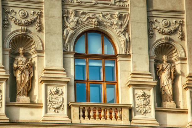 Prague, Czech Republic, April 6 2019 - Close up of Prague National Museum window with statues on a sunny day