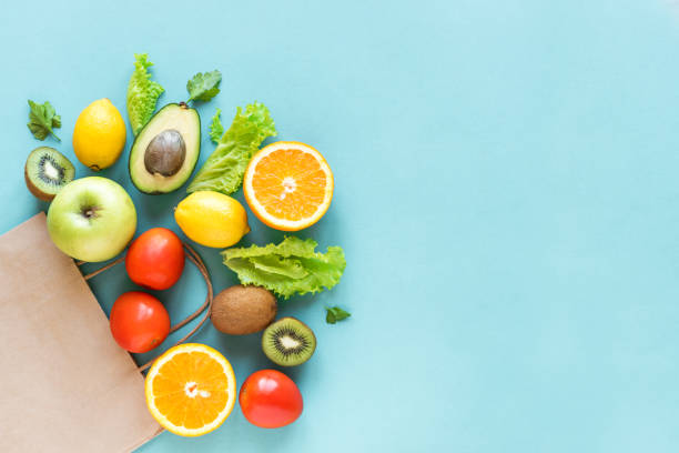 shopping di cibo sano - healthy eating multi colored orange above foto e immagini stock