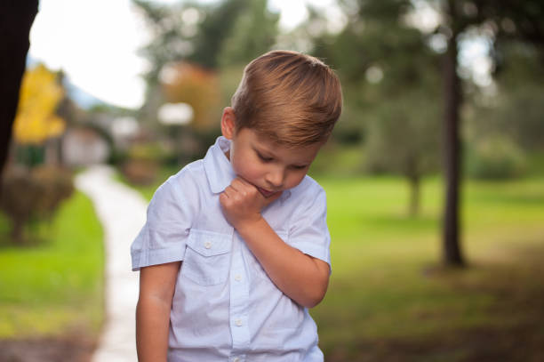 istock Cheerful cute little brown-eyed boy 1140837143