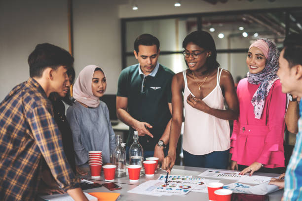 istock Diverse millennial and mature business people in teamwork 1140837253
