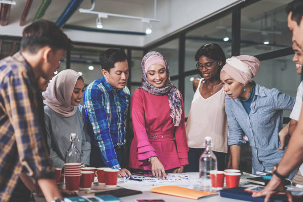 istock Business coach motivates employees. 1140837402