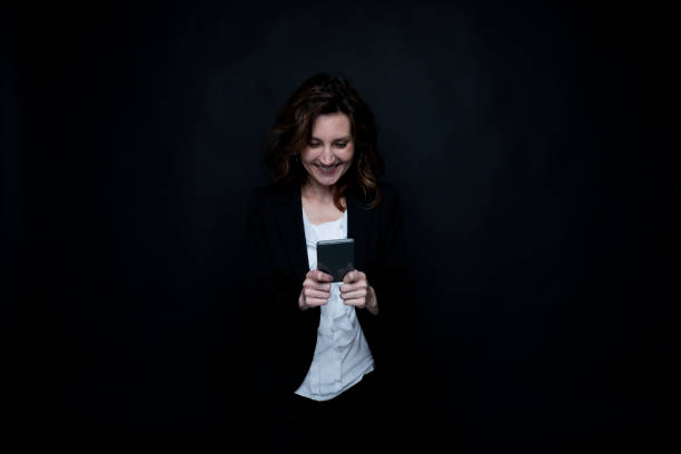 istock Businesswoman is using her phone 1140838715