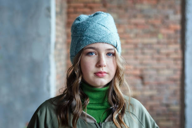 istock young girl in an abandoned building alone 1140844299
