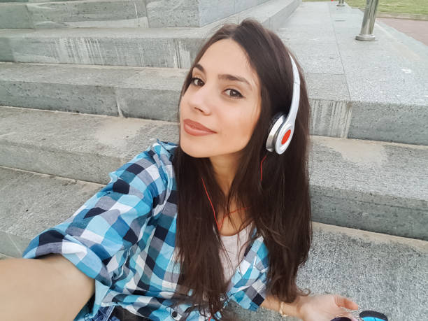 istock Making selfie in a city park 1140844358