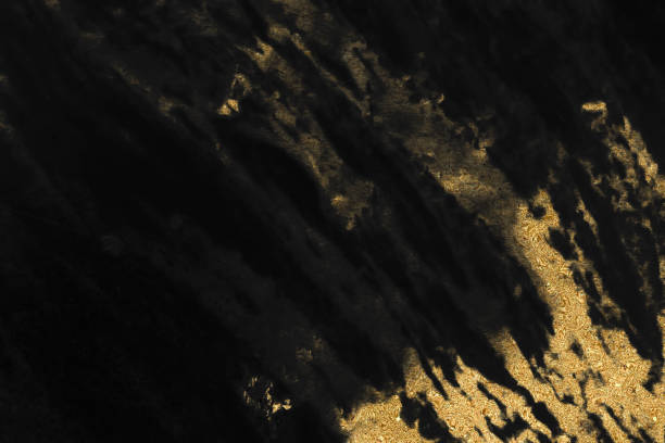 istock Black marble texture with gold pattern background design for cover book or brochure, poster or realistic business and design artwork. 1140848060