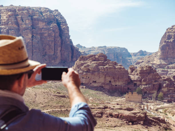 istock Man with a mobile phone. Petra, Jordan 1140848111