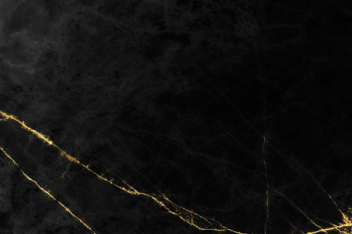 Black marble texture with gold pattern background design for cover book or brochure, poster or realistic business and design artwork.