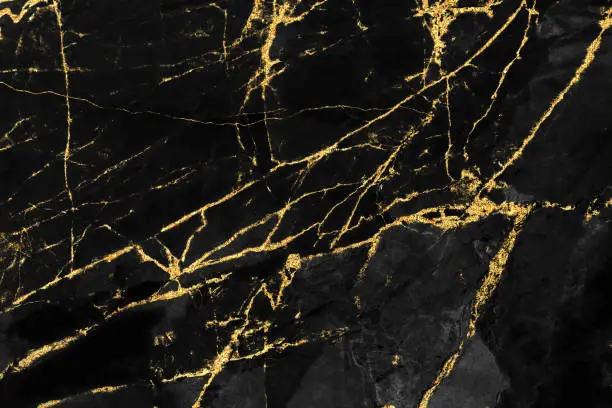 Photo of Black marble texture with gold pattern background design for cover book or brochure, poster or realistic business and design artwork.