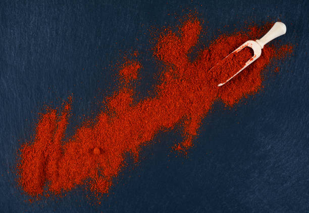 istock Dry ground paprika on a dark background. 1140851451