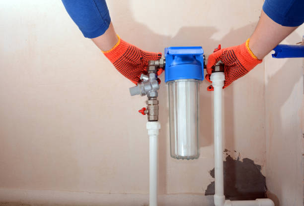 istock Installation of a reducer and a water filter for water purification. 1140851811