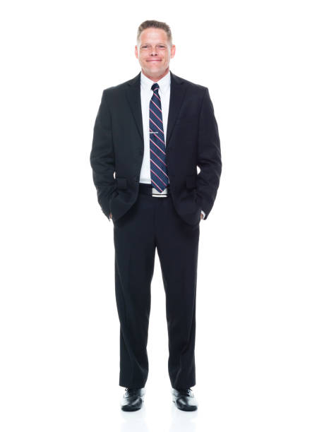 istock Businessman is standing with hands in pockets 1140858141