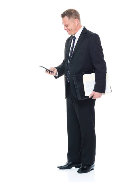 istock Businessman is looking on mobile phone 1140860516