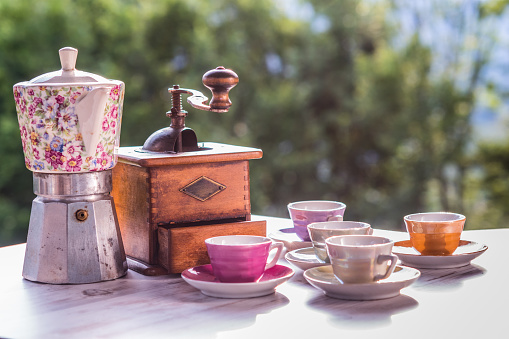 Vintage manual coffee grinder and Chinese teaset