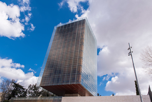 Low angle view of a modern building at Madrid city, Spain.