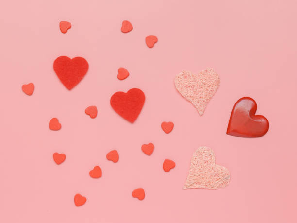 istock Pattern made of hearts on pink background. Flat lay, top view, close-up 1140865843
