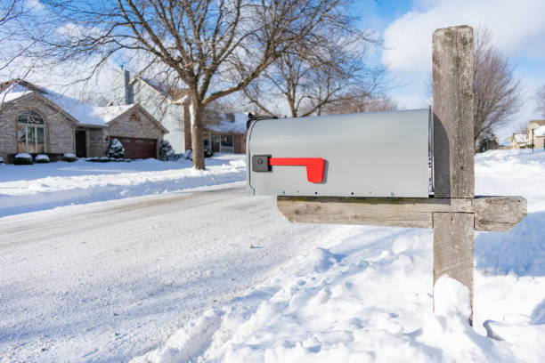 istock A Home Mailbox buried in Snow after a Snowstorm 1140876016