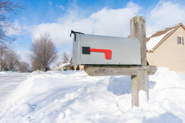 istock A Home Mailbox buried in Snow after a Snowstorm 1140877206