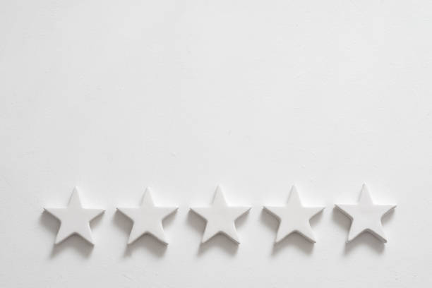 Customer experience. Service rating and review. Assessment survey. Five star shapes. Copy space on white background.
