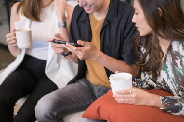 istock Coffee break Portrait young asian creative business person working success project with team Business people weare casual suit outfit working happy action  in modern Coworking space 1140880549
