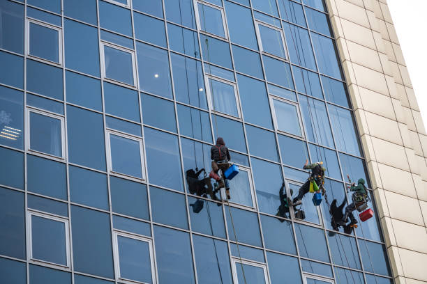 istock Glass clean man building tower work business 1140894079