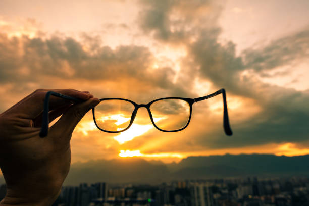 istock Looking through glasses to city view 1140902789